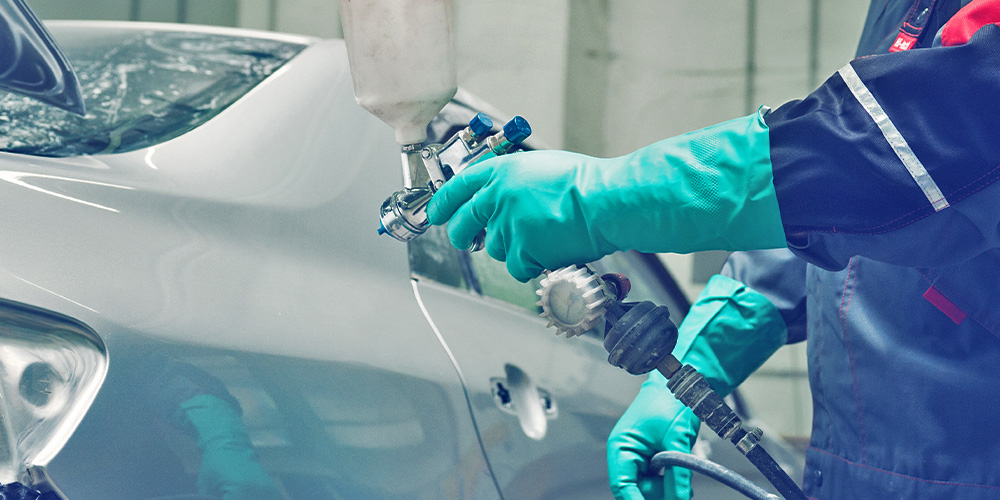 Image Of Car's Body Being Painted White